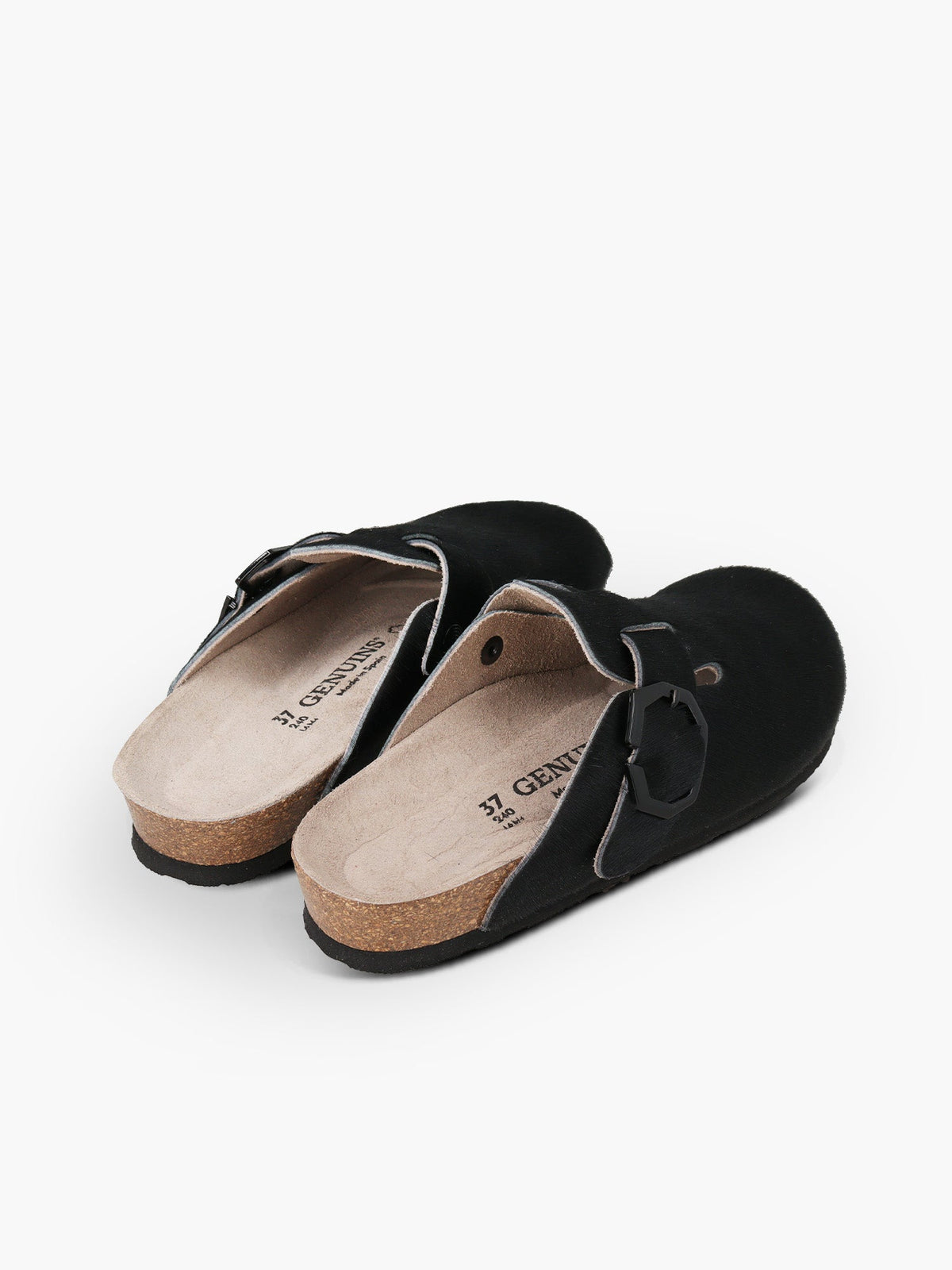 A pair of Genuins Indiana clogs in black with a cork footbed